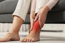person holding sparined ankle