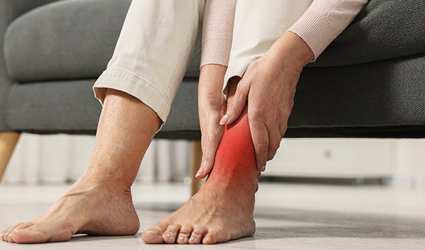 person holding sparined ankle