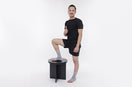 person wear gray ankle support and giving thumbs up