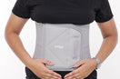 woman wear a gray belt after c section delivery 