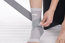 man wearing ankle brace