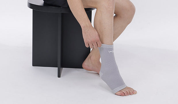 person wear the ankle protectors