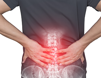 a man hold his back with both hands indicating in major back pain