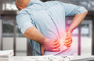 man suffering from back pain
