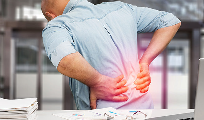 man suffering from back pain