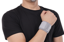 man wear gray wrist brace with leeford branding