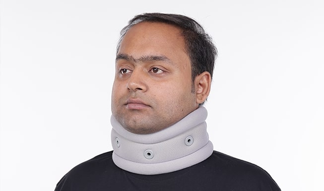 a man with neck belt
