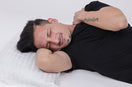 person in the sleeping postion struglling with the neck pain