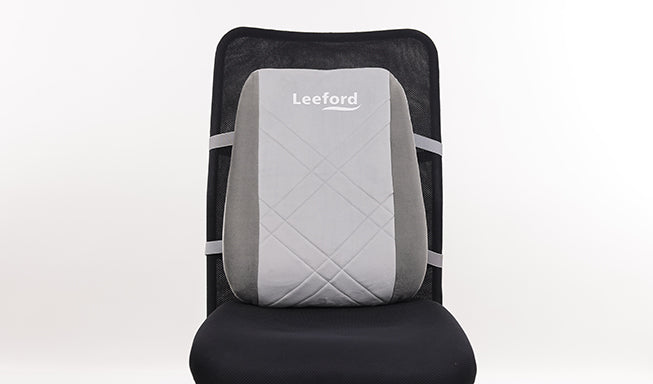 a gray back support cushion with leeford branding attached with chair