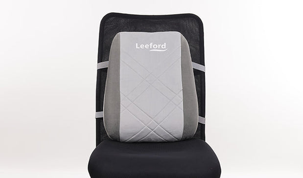 a gray back support cushion with leeford branding attached with chair