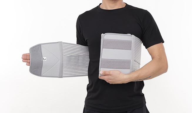 man wear a gray chest binder belt with leeford branding