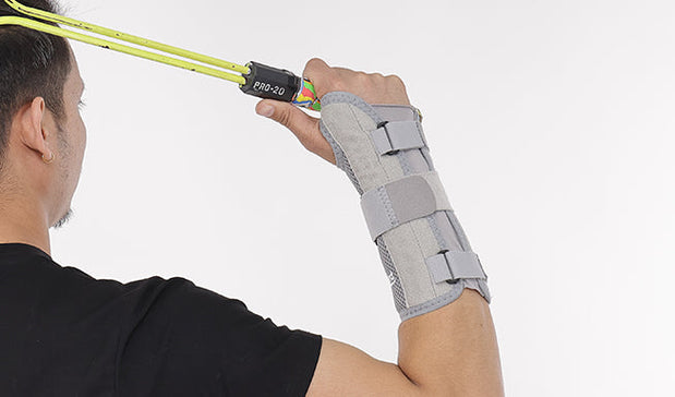 men playing wrist splint while playing badminton