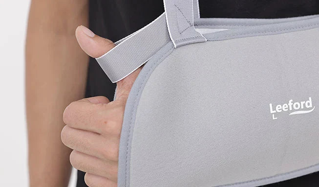 person with hand fracture belt