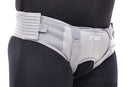 man wear a gray hernia belt with leeford branding on it