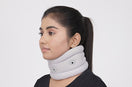 woman uses neck pain band gray 