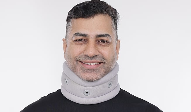 person wear a gray neck collar