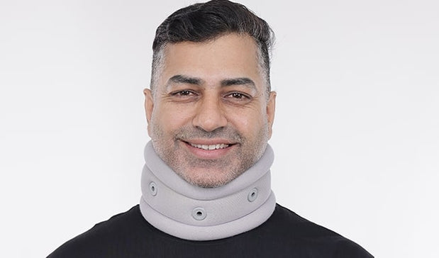 person wear a gray neck collar