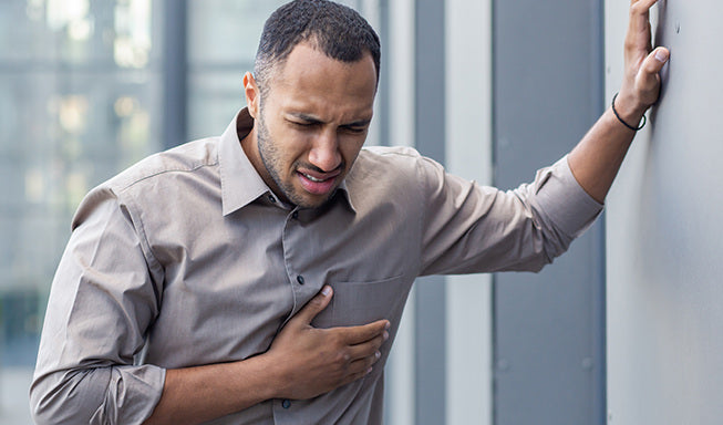 man sufferring with Intercostal Muscle Strain