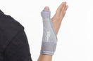person wear gray thumb brace with leeford branding