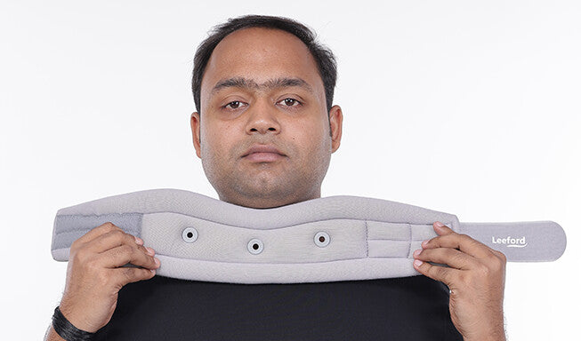 man wearing a gray cervical collar