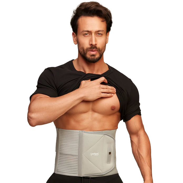 tiger shroff wearing a gray abdominal belt