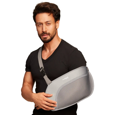 Man wearing a gray arm sling pouch