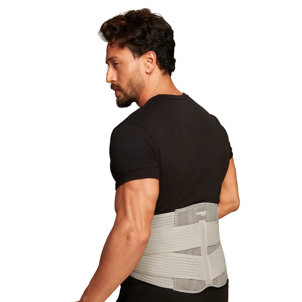 man wearing a gray lumbo sacral belt