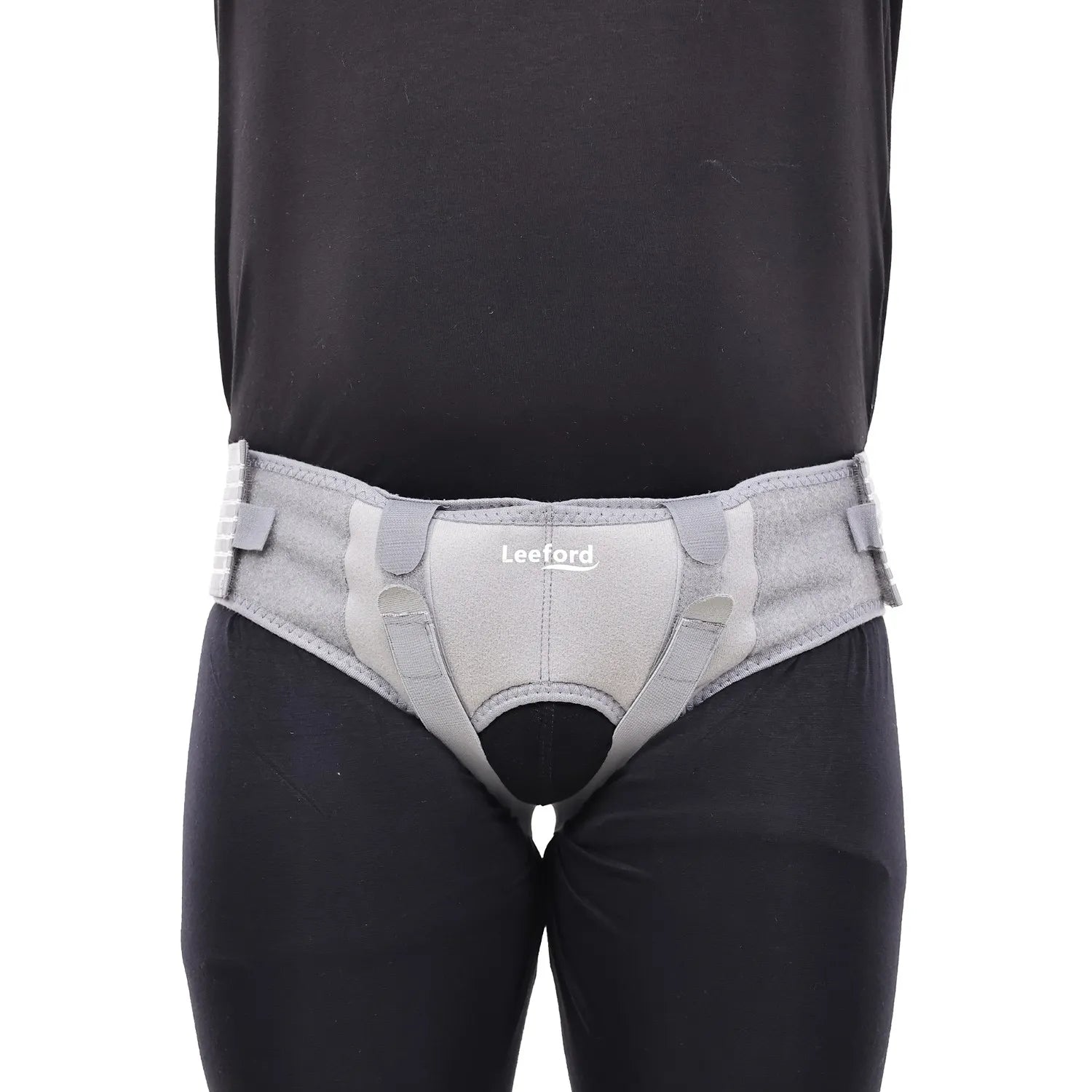 person wear a gray hernia belt