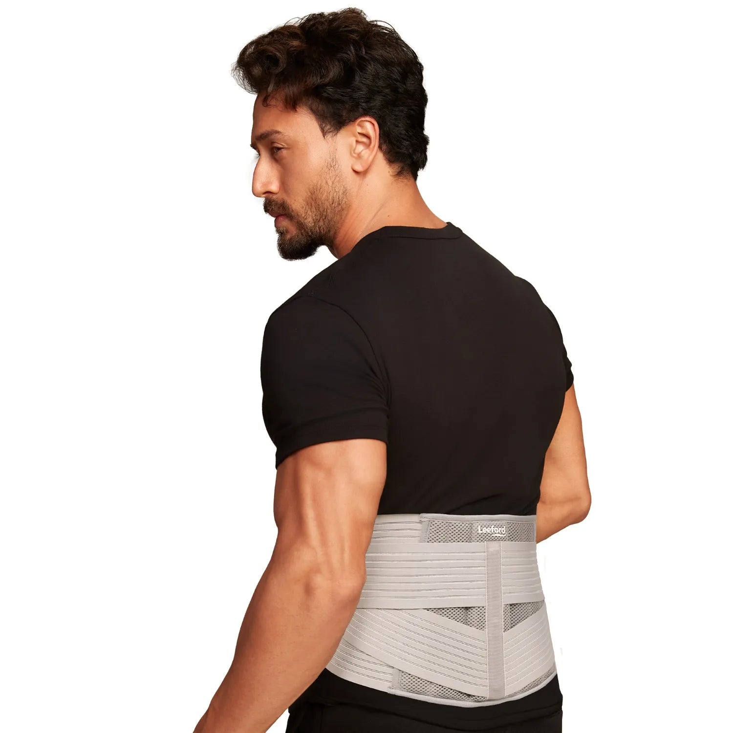 Man wearing a gray lumbo sacral belt