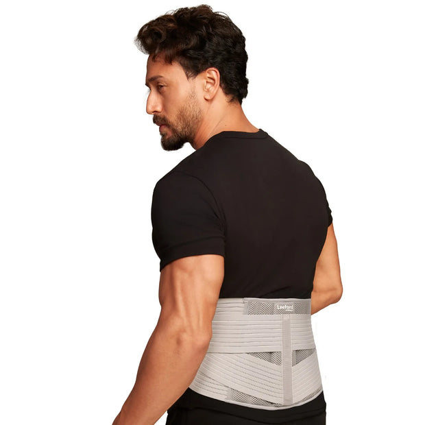 Man wearing a gray lumbo sacral belt