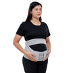 Woman wearing a gray maternity belt on a white background