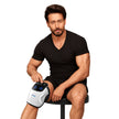 man wear knee massager on his left leg