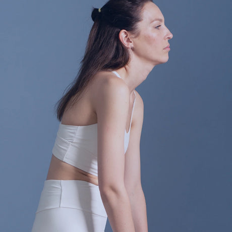 Slouched back