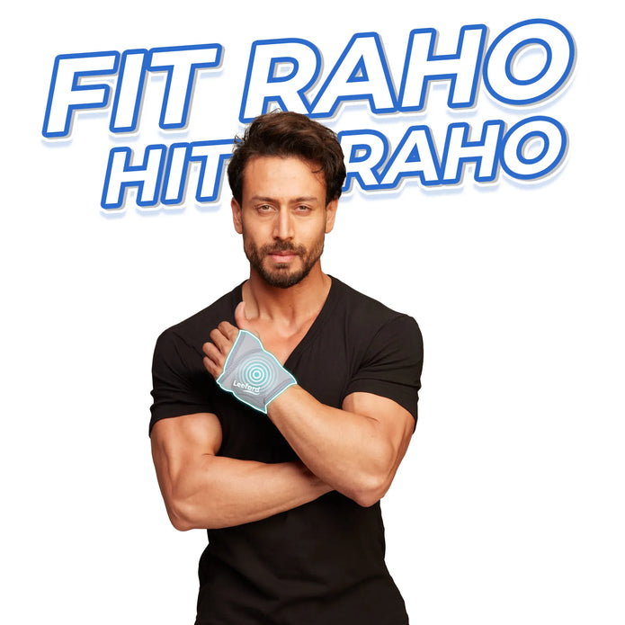 tiger shroff wearing a gray wrist brace